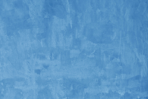 Billed af væg med blå kalkmaling